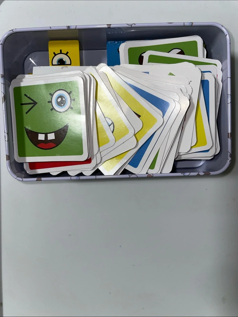Colorful Face-Change Puzzle Tin Instruction Card